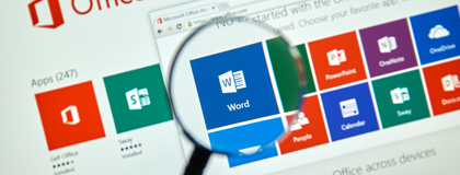 A magnifying glass looking closely ay the Microsoft 365 environment and its security configurations