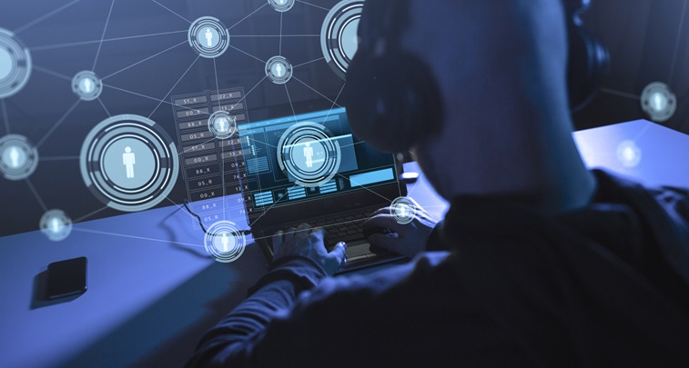 A hacker attempting to gain access to an organisation systems and data using phishing and the exploitation of vulnerabilities