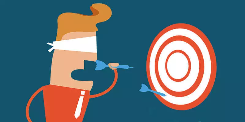 A blindfolded man throwing a dart at a dart board, representing the blind spot of third party risks